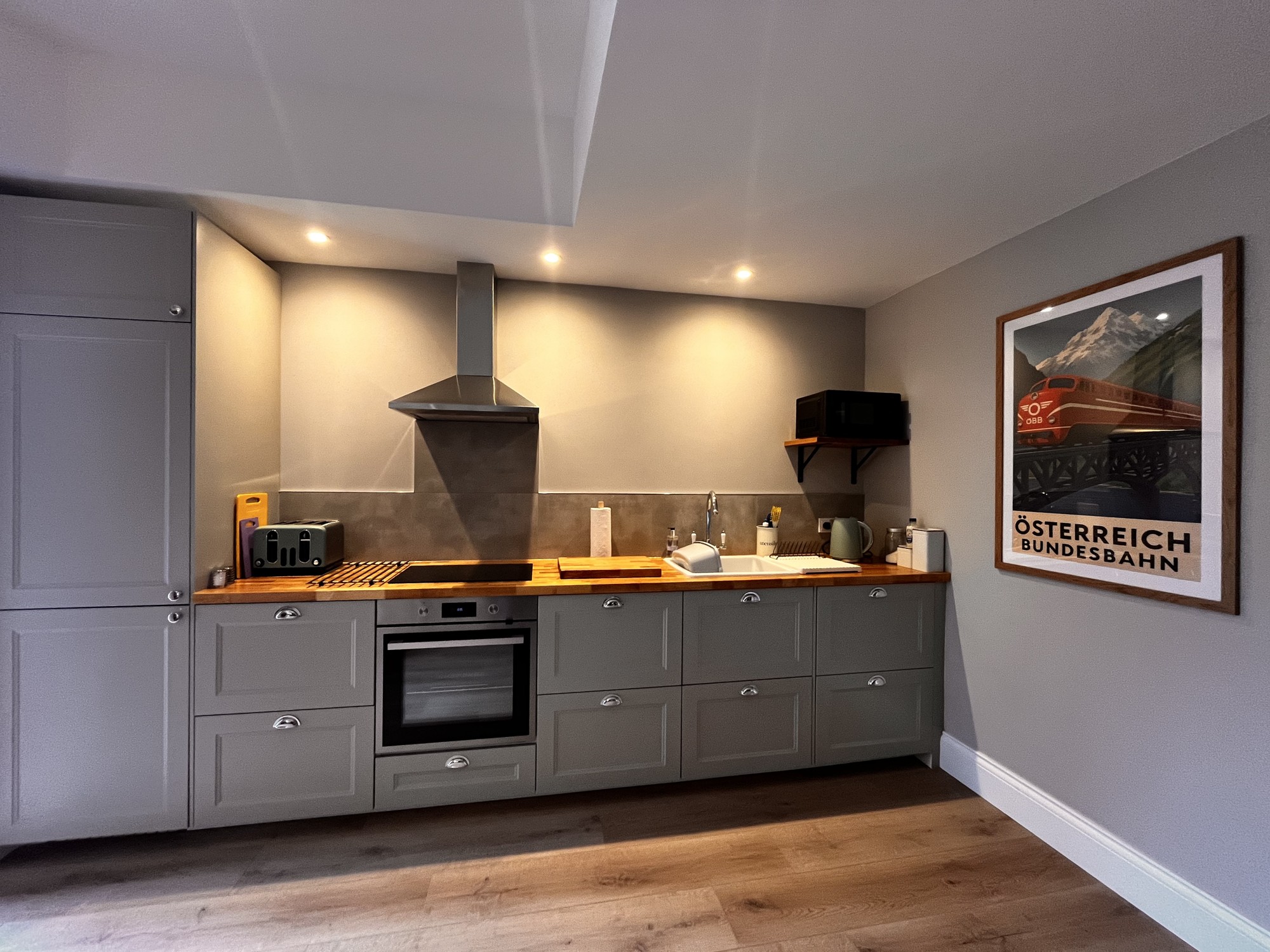 Fully fitted kitchen with fridge freezer, oven, hob and dishwasher