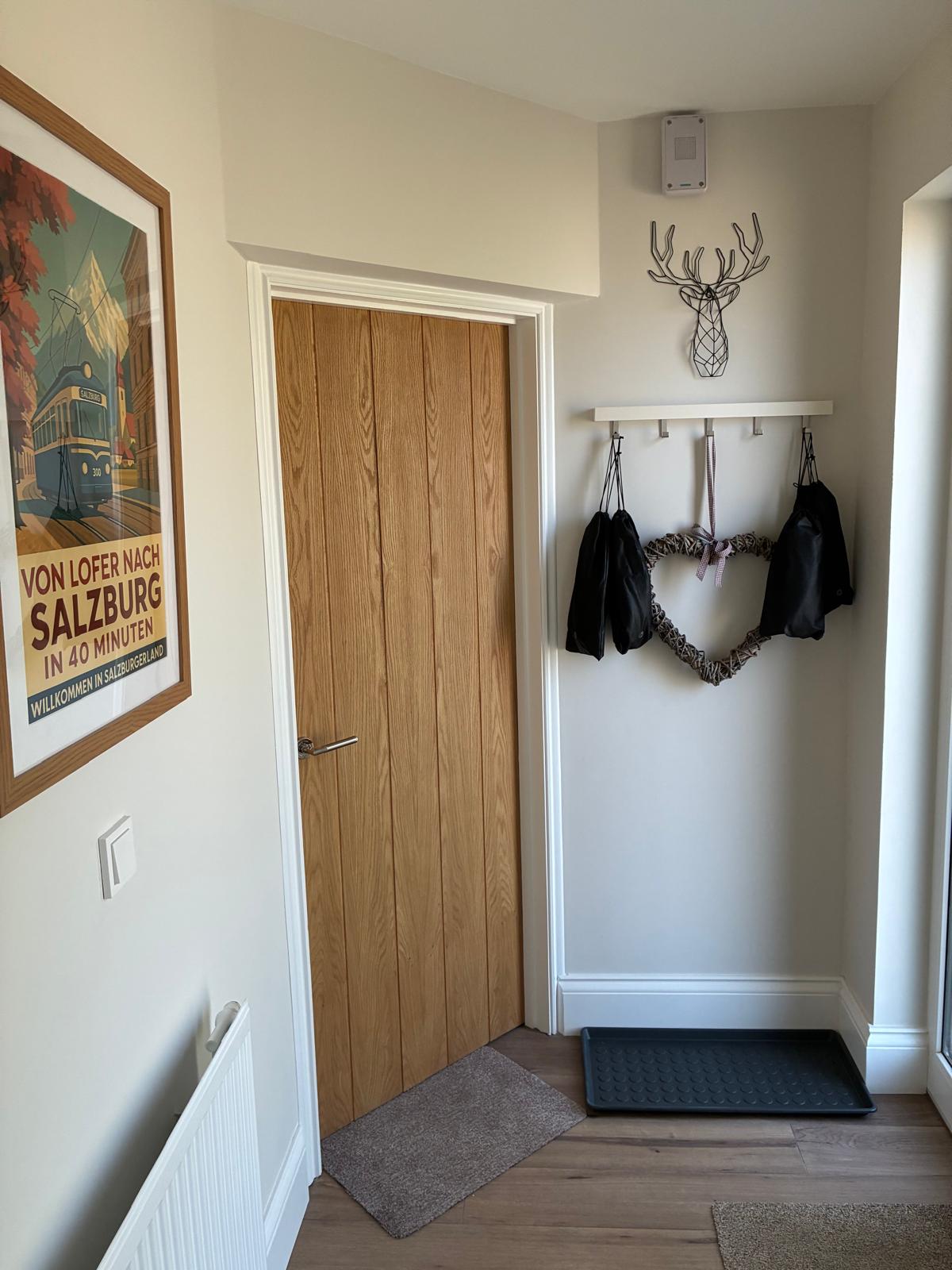 Gretl entrance porch with coat hooks and boot storage