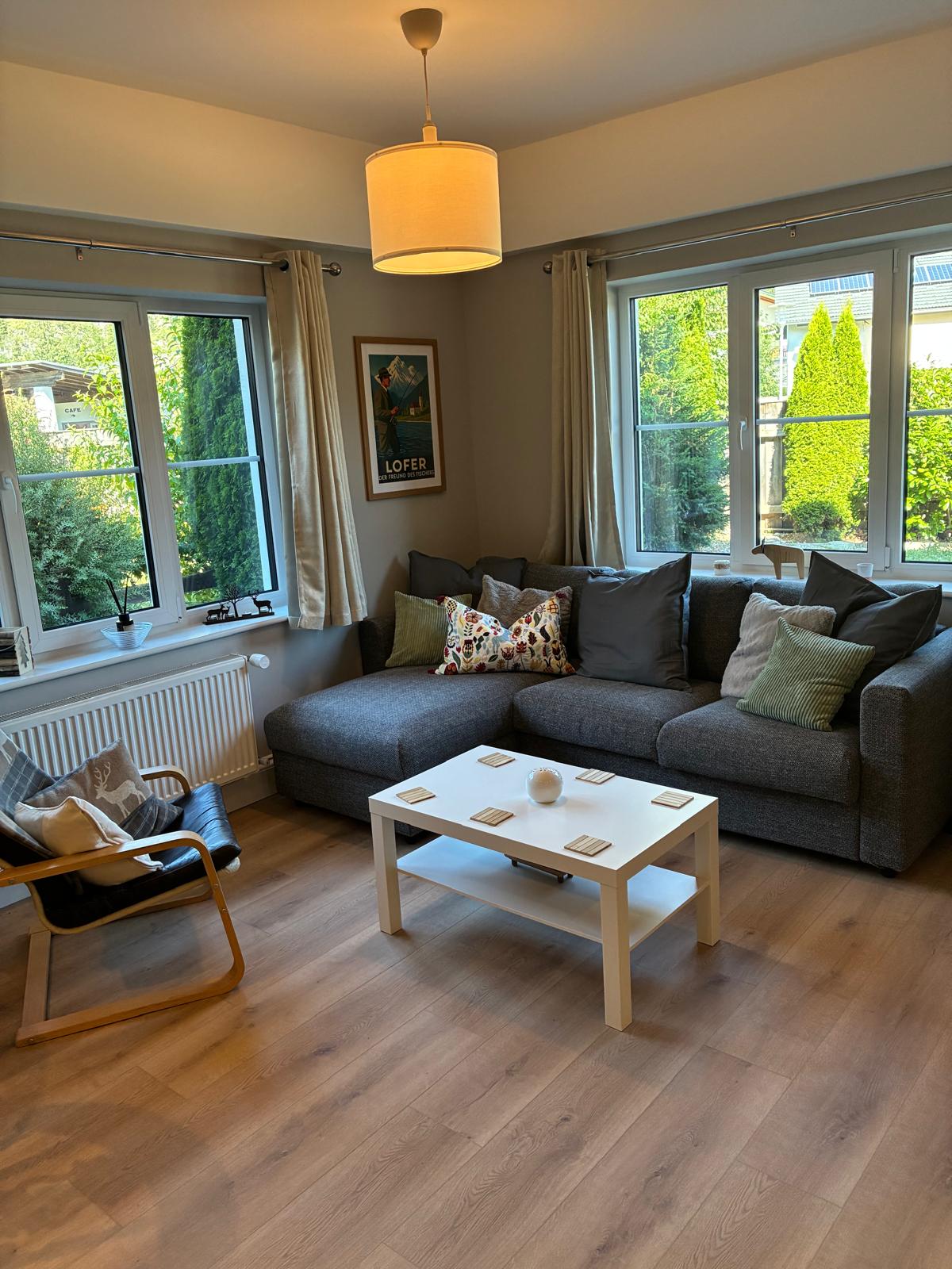 Gretl sitting area with a corner sofa, armchair and coffee table